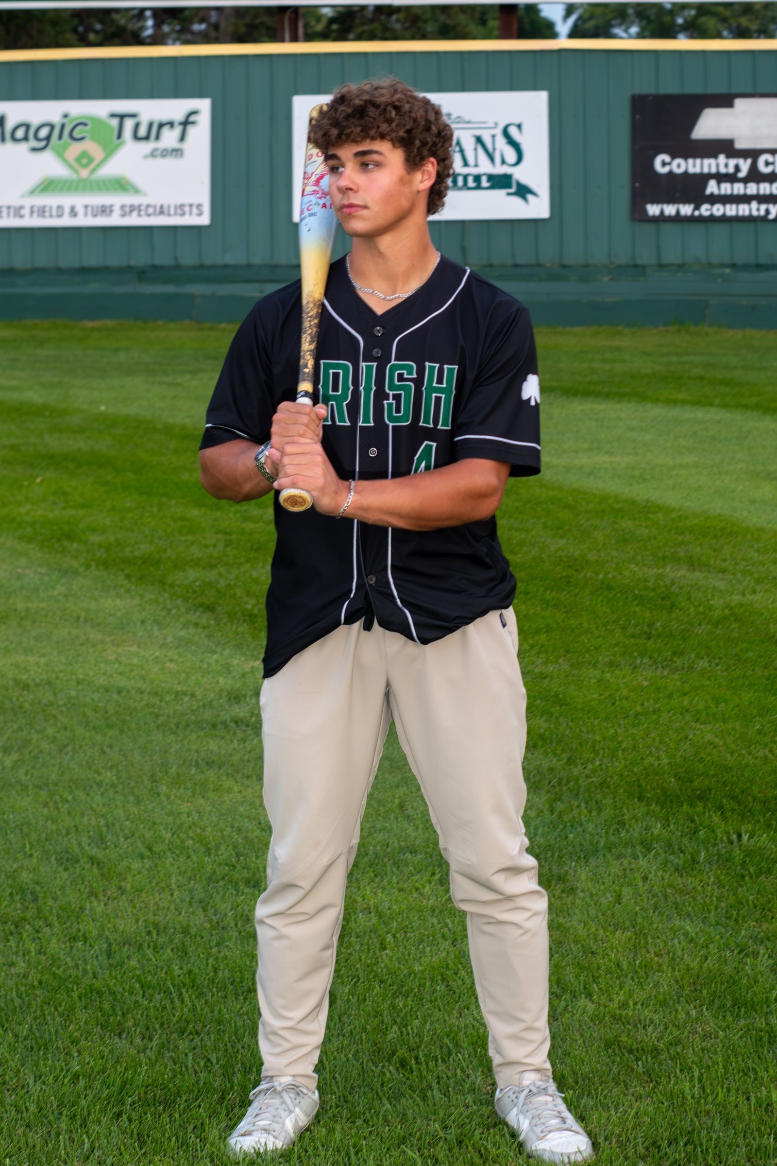 High school senior boy in baseball uniform - Coon Rapids MN senior photographer Steve Lunden