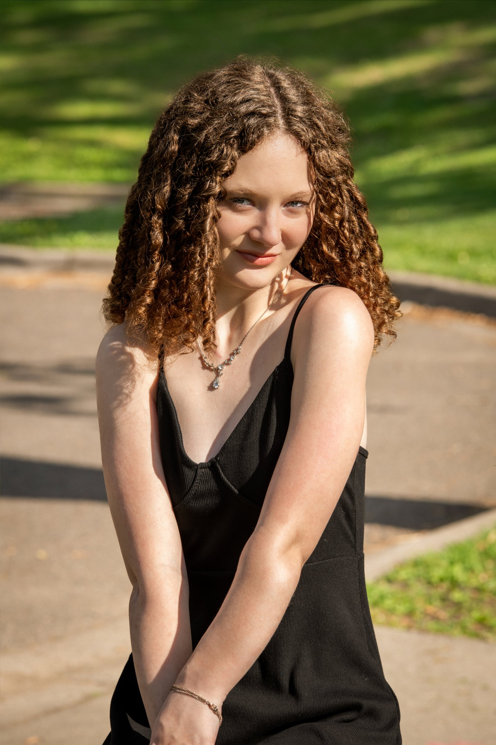 Senior girl by lake at golden hour - Twin Cities senior portrait photographer Steve Lunden